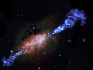 Рисунок далекой галактики с активной черной дырой (space.com)