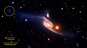 Галактики NGC 6872 и IC 4970 и удаляющаяся молодая галактика (nasa.gov)