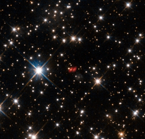 Далекая галактика PKS 1830-211 (eso.org)