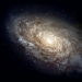 Наличие у галактик оси симметрии ставит под сомнение структуру Вселенной.